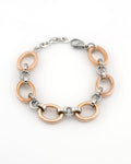 Meridian Chain Bracelet Frosty Rose - 18K rose & white gold PVD stainless steel, curled top-down view