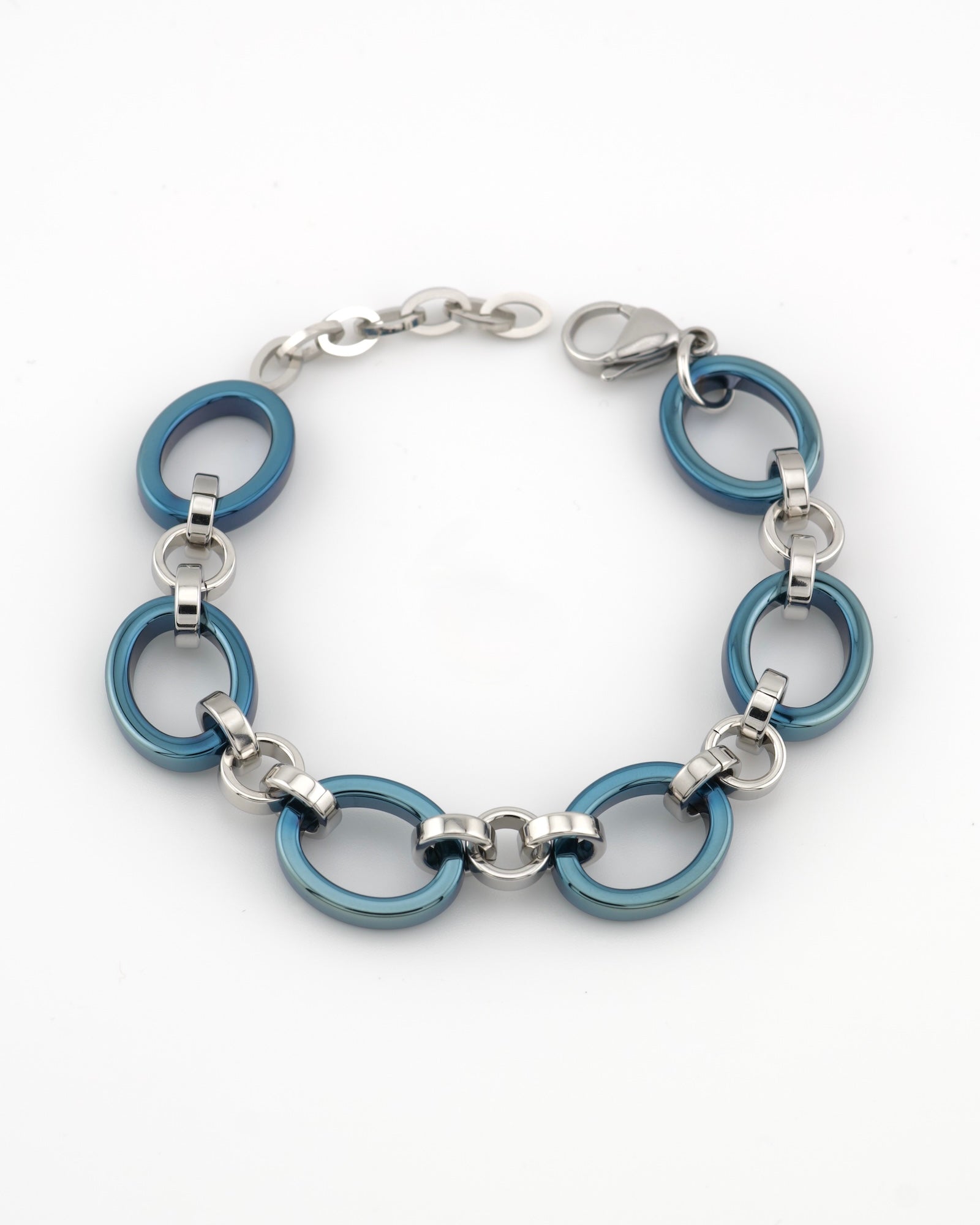 Meridian Chain bracelet with ice blue and 18K white gold links on a white background