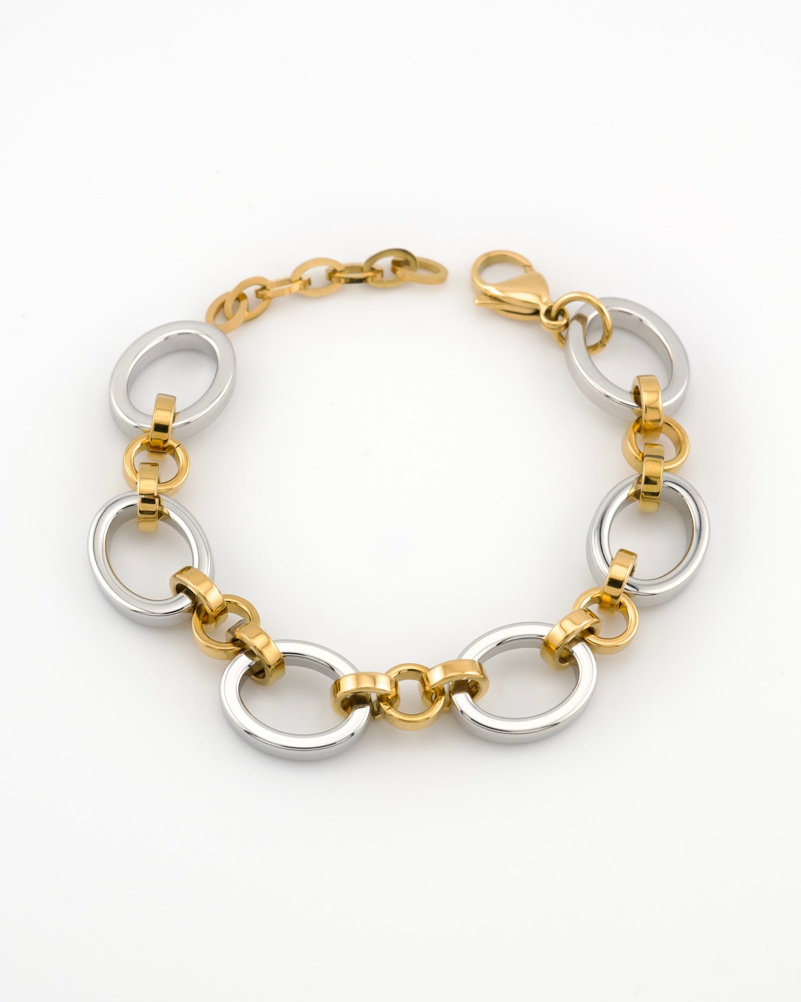 Meridian Chain bracelet with 18K white and yellow gold links on a white background