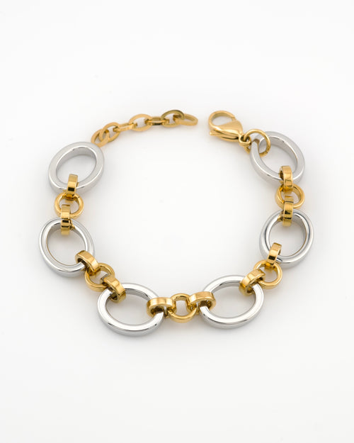 Meridian Chain bracelet with 18K white and yellow gold links on a white background
